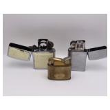 Set of three vintage lighters including a Zippo
