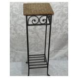 FL)  Metal stand with woven top plant stand.