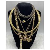 R2) 6 necklaces and a bracelet a few are from Avon