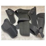 AR) 5 pistol holsters, three are made by Uncle