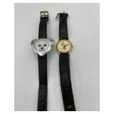 Two watches both with black bands