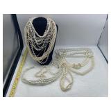 R2) Assortment of pearl necklaces some have damage