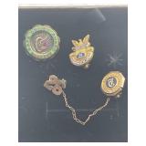 R2) Gold Award pins for services given to safe