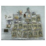 R2) Large group of pins and key chains all from