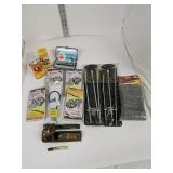 Gun locks, rifle cleaning rats,
Flashlight,