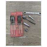 Assorted snap-on tools
Four-piece screwdriver