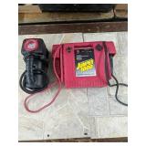 Tire pump and a jumper 1,000