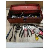 Vintage tool box with assorted tools