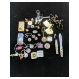 Assorted smalls,
Tags, pins, buttons key chains &