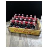 Four six packs eight fluid ounce Coca-Cola