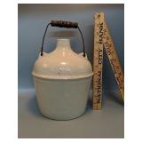 Stoneware jug
Wire and wooden handle