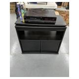 Swivel top TV stand With 
VHS player with 101