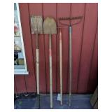 Four Garden Tools 
Shovels rake and a hoe