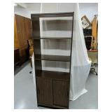 Shelving unit with sliding doors
66" Tall 11.5