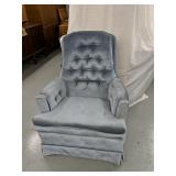 Crushed blue swiveling rocking chair
