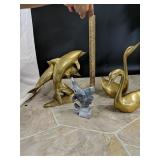 Brass swans and dolphins