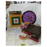 Dart boards number and letter tiles and a peg
