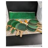 Table tennis paddles and balls
Silver cup and Mr