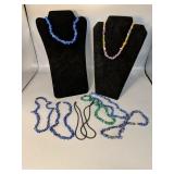 2- 4mm black on beads 16" long
One uncut