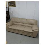Cream colored leather couch
Has scratches