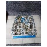 An assortment different sizes clevis grab hooks