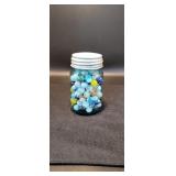 Ball jar full of marbles