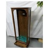 Curio cabinet made of solid oak and oak veneers