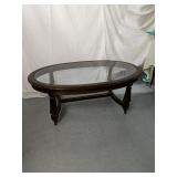 Wood Oval Glass Top coffee table 
17"tall x 48"
