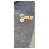 Cast iron tractor sprinkler 
20 in long
9 in