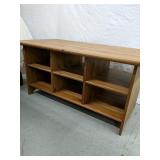 Wood coffee table with cubbies
21" Tall 47"x23"