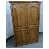 Wood Entertainment center
58" Tall 36" x 21"
