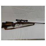 Lot#33 Savage Anchutz 54m sporter 22WMR (22mga) Redfield scope