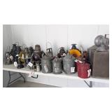 Antique jugs, oil cans and railroad lights