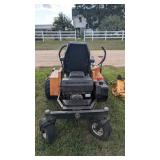 Woods Mowin Machine zero turn riding mowe