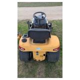Cub Cadet riding mower with snow plow