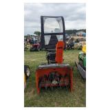 Snow blower with cab