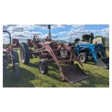Antique Farmall tractor with loader