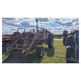 Antique Farmall tractor with loader