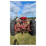 Antique Farmall tractor with loader