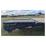 Flatbed gooseneck trailer with ramps and beavertail