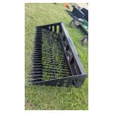 Quick attach skid steer rock bucket
