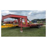 Double axle flatbed trailer with beaver tail and ramps