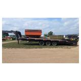 Tri axle flatbed trailer with dove tail and ramps