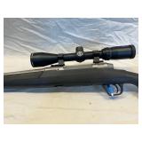 Savage Axis 223 bolt action w/ stainless steele black stock acc trigger w/ scope