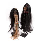 Two Shrunken Heads--Tsantsas On Display Stands