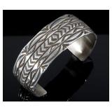 Signed Navajo Sterling Silver Carved Bracelet