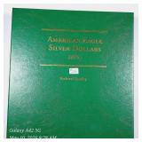 8  $1 Silver Eagles in Littleton Album