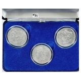 1880-O, 1889-O & 1894 Morgan Dollars in display