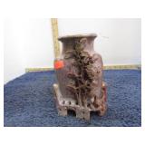 CARVED STONE VASE IN FFLOWERS