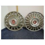 2-- VINTAGE MUSTANG HUBCAPS -- ONE IS DAMAGED